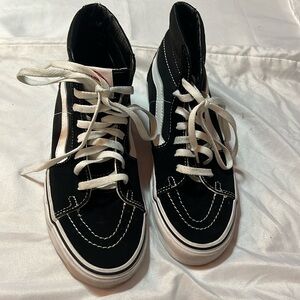Vans, Size 8 Women, Size 6.5 Men Black and White Sneakers.